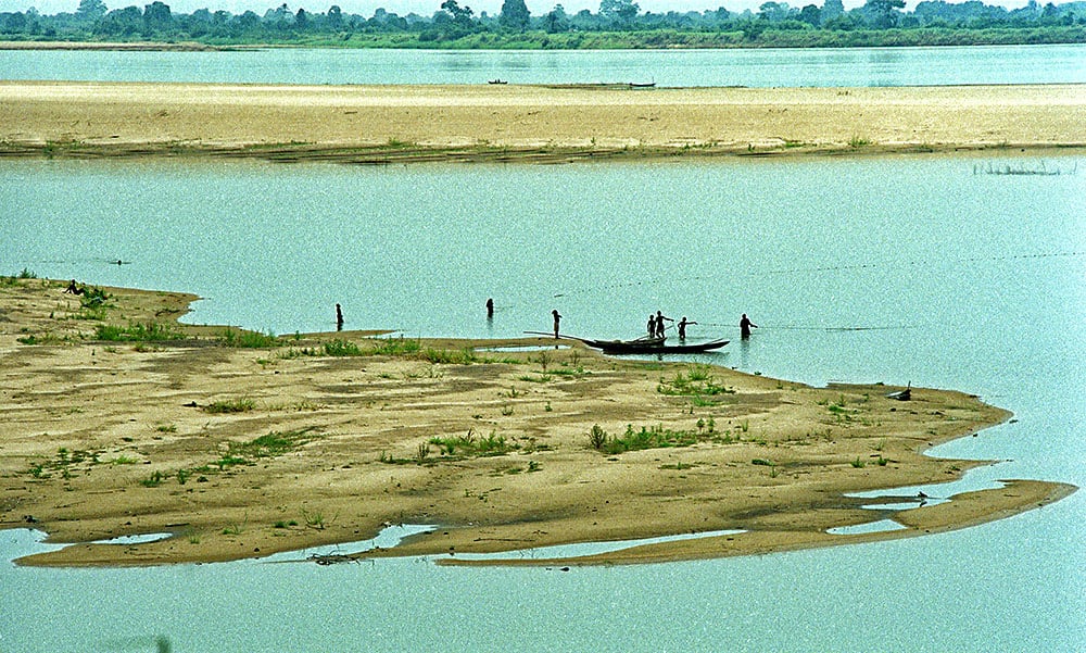   The Niger River with islands and fishermen.